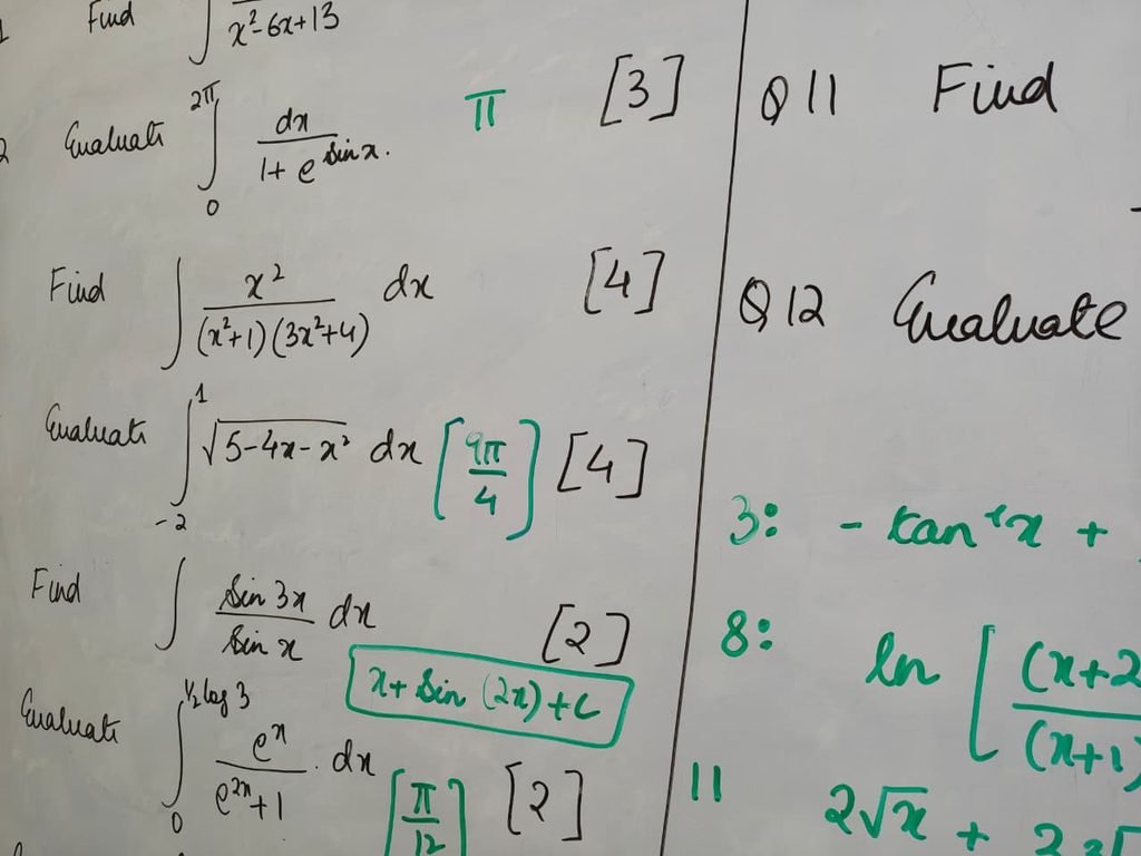 Class white board with integration questions